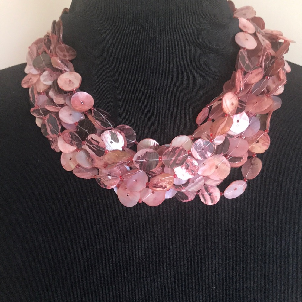Iridescent shell necklace and earrings.